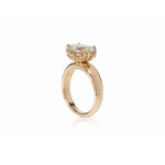 This diamond ring is the first design from a new collection of signature pieces that reveal unexpected details, all with movement at their centre. Forms that change configuration, that move and spin. Jewellery that responds to touch and exploration, that you can connect with, play with and make your own. 
